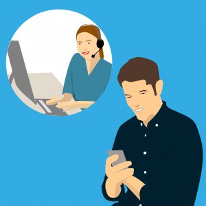 Obraz przedstawia mężczyznę i kobietę kontaktujących się ze sobą telefonicznie